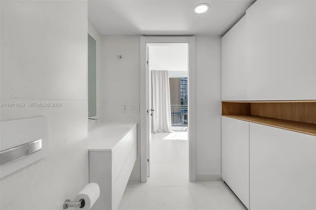 a bathroom with a shower and a toilet