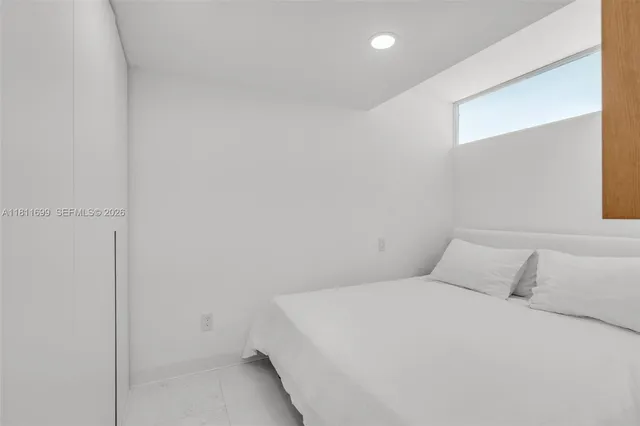 a hallway with wooden floor