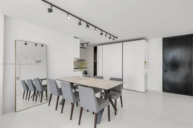 a view of a dining room with furniture