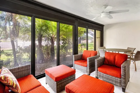 a living room with city view and a large window