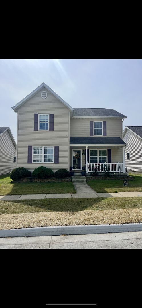 a view of a house with a ocean view