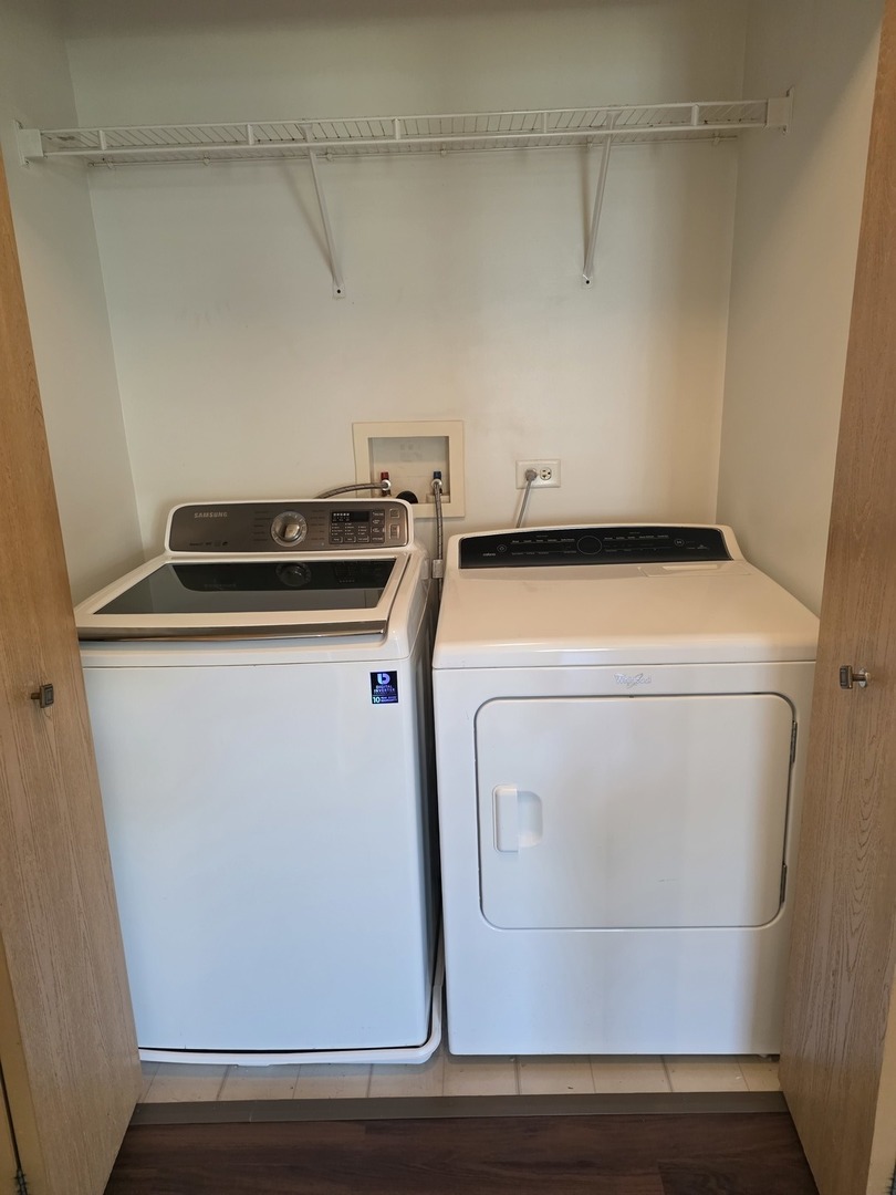 2125 Silverstone Drive, Unit 2113 Carpentersville, IL 60110 - Photo 4 of 4 a utility room with dryer and washer