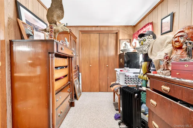 a view of living room with furniture and a chandelier