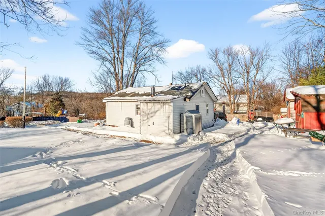 a view of a city street with a building