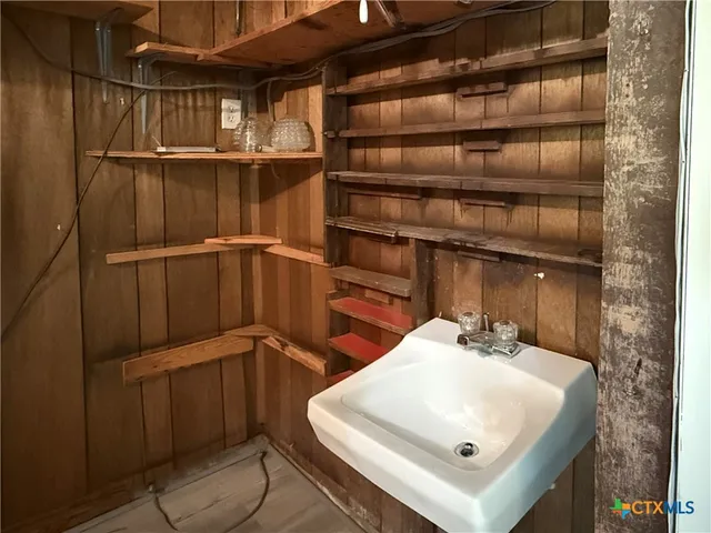 a white refrigerator freezer sitting inside of a kitchen