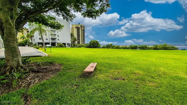a view of a garden with a house