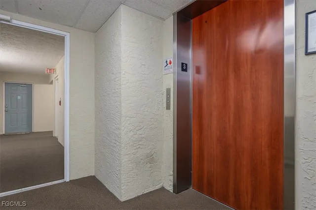 a view of a swimming pool with outdoor seating