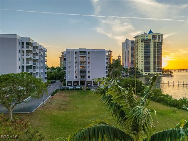 an aerial view of a house with yard swimming pool and outdoor seating