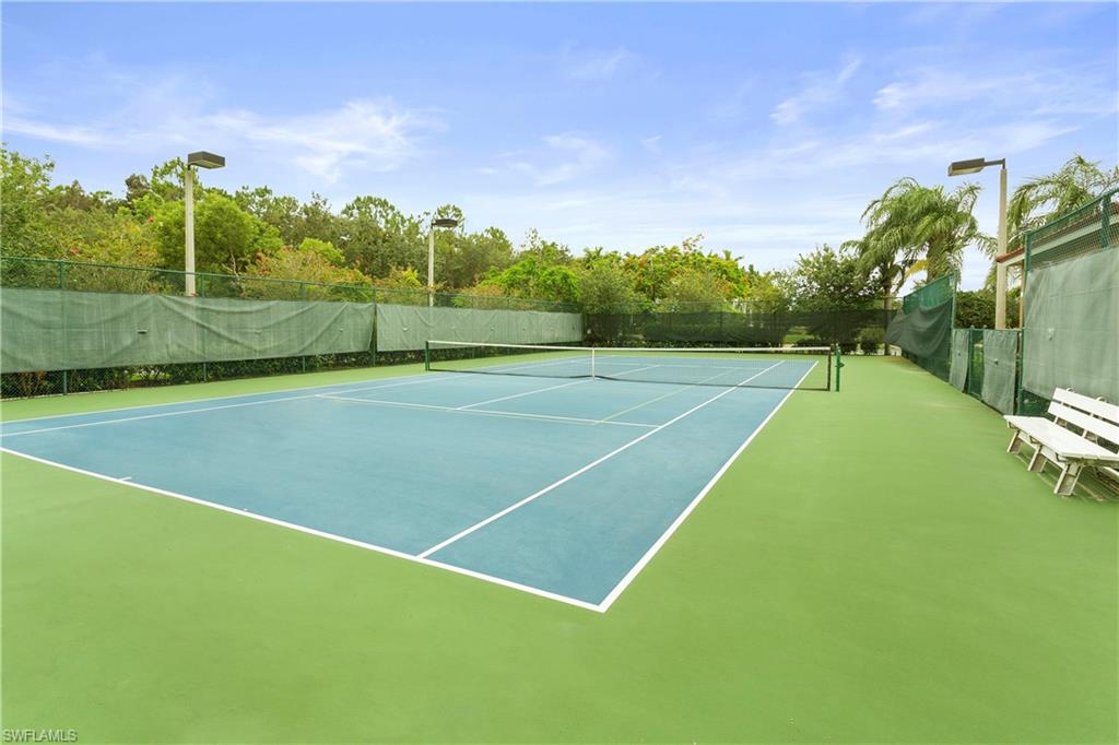 Undisclosed Address Naples, FL 34112 - Photo 16 of 23 a view of an outdoor space and tennis court