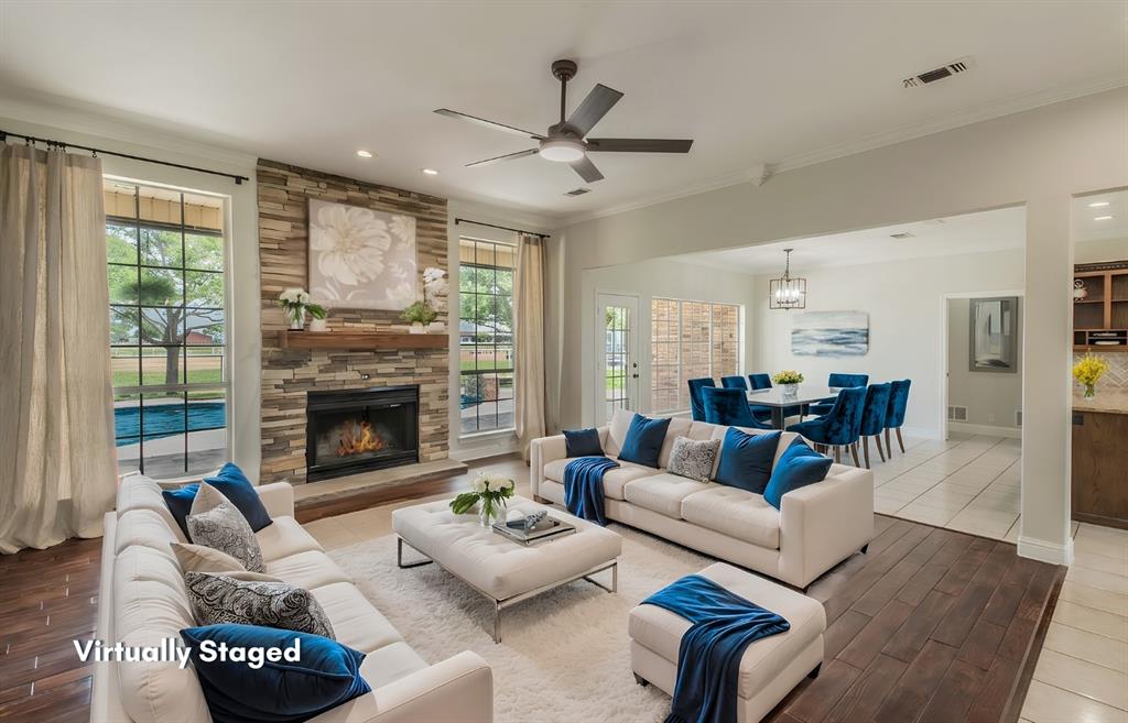 13507 Friendship Road Pilot Point, TX 76258 - Photo 4 of 39 a living room with furniture fireplace and a large window