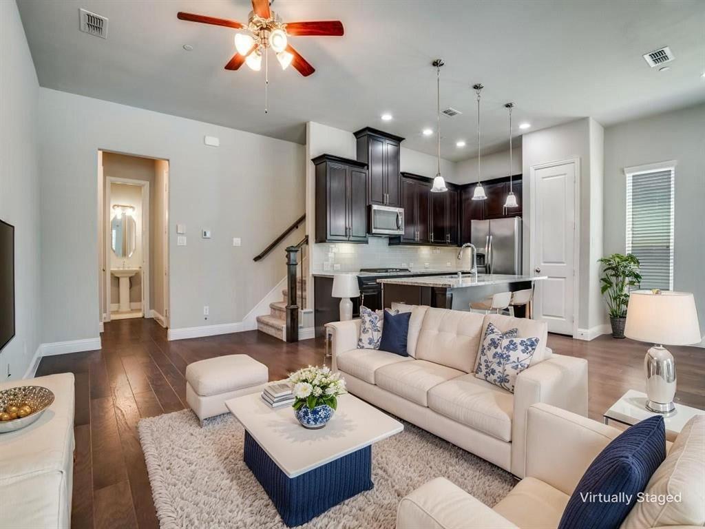 6120 Rilla Street Frisco, TX 75035 - Photo 3 of 20 a living room with furniture kitchen view and a chandelier
