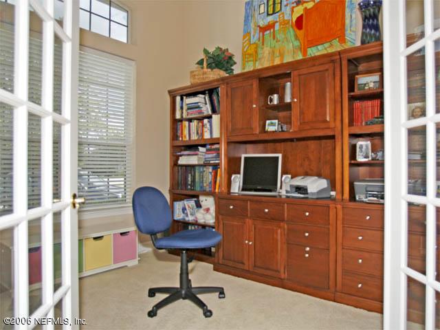 10027 Deercreek Club Road Jacksonville, FL 32256 - Photo 8 of 15 a workspace with furniture and window