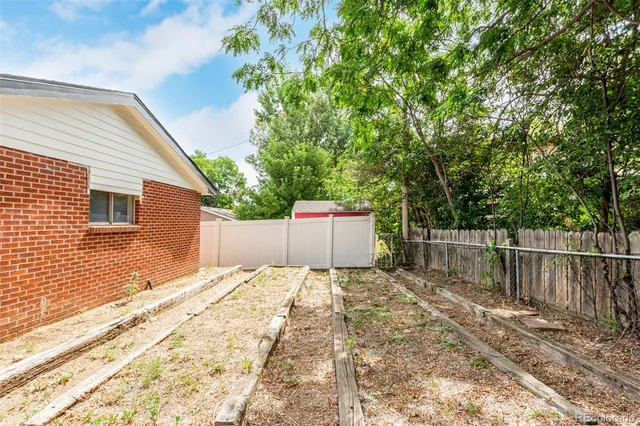 a backyard of a house with a patio