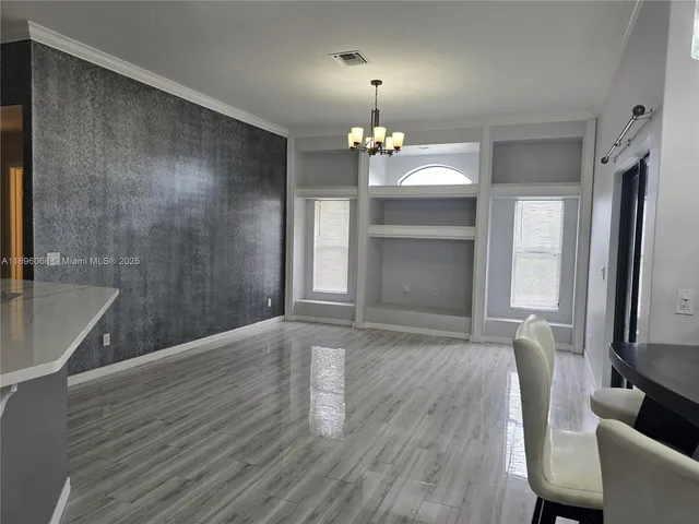 a view of a livingroom with a chandelier