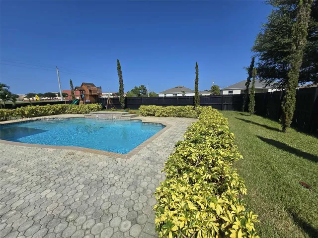 a view of a garden with a slide