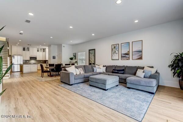 3081 Pullian Court Jacksonville Beach, FL 32250 - Photo 23 of 56 a living room with furniture and view of kitchen