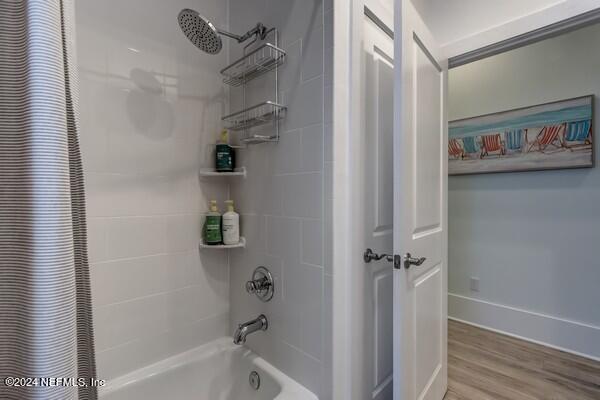 3081 Pullian Court Jacksonville Beach, FL 32250 - Photo 35 of 56 a bathroom with a bathtub and a shower