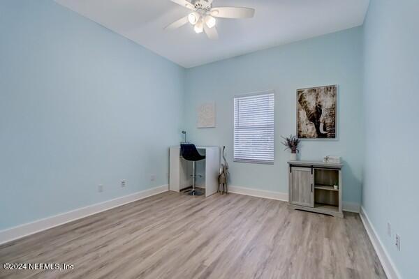 3081 Pullian Court Jacksonville Beach, FL 32250 - Photo 36 of 56 wooden floor in an empty room with a window