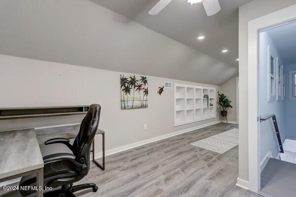 3081 Pullian Court Jacksonville Beach, FL 32250 - Photo 42 of 56 a view of a hallway with wooden floor and a cabinet
