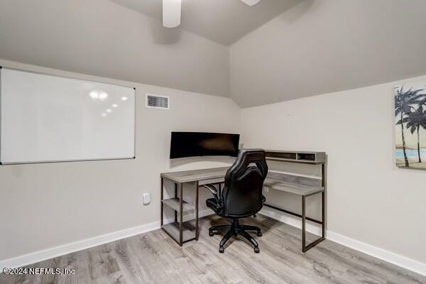 3081 Pullian Court Jacksonville Beach, FL 32250 - Photo 43 of 56 a view of a workspace with furniture and a window