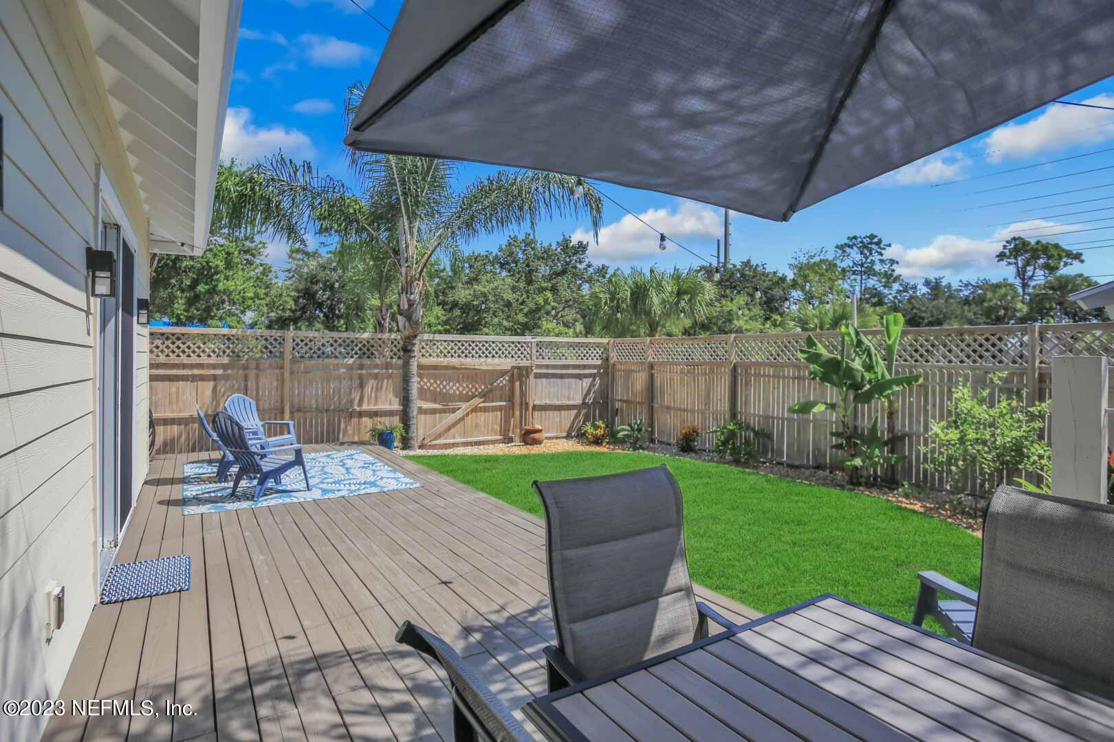 3081 Pullian Court Jacksonville Beach, FL 32250 - Photo 46 of 56 a view of a table and chairs on the roof deck