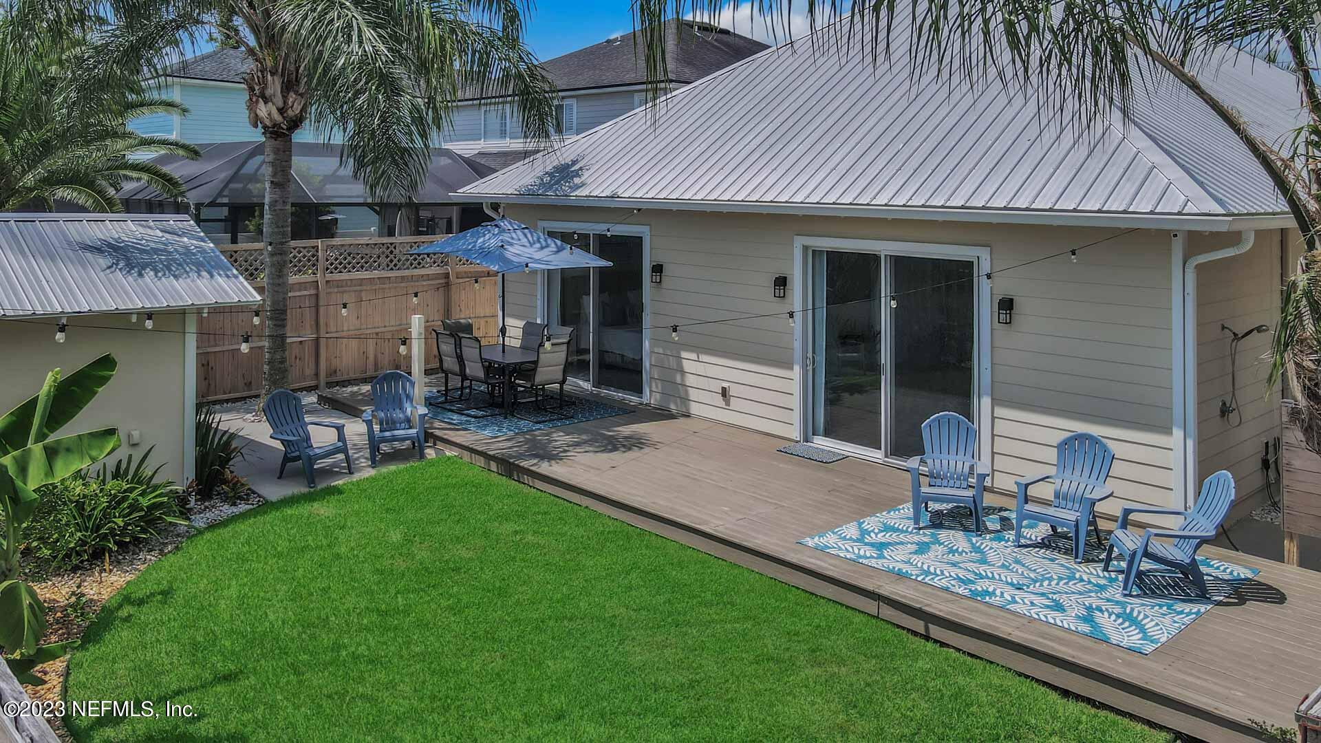 3081 Pullian Court Jacksonville Beach, FL 32250 - Photo 49 of 56 a view of a house with backyard and sitting area