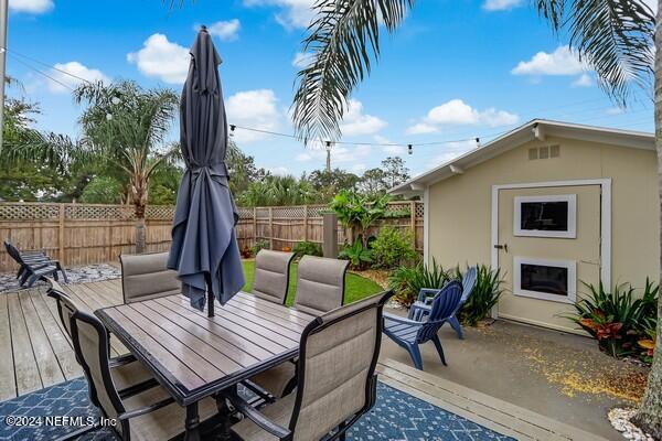 3081 Pullian Court Jacksonville Beach, FL 32250 - Photo 53 of 56 a view of outdoor sitting area with furniture and wooden floor