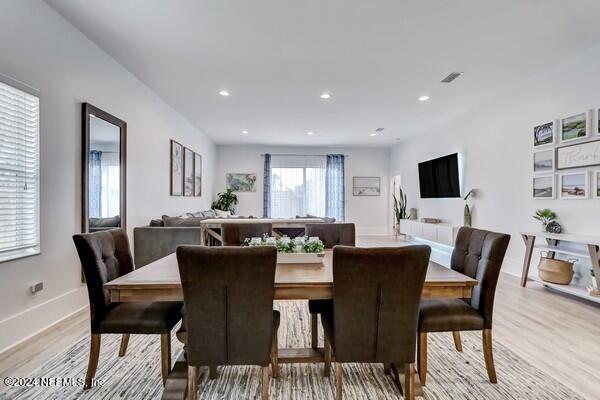 3081 Pullian Court Jacksonville Beach, FL 32250 - Photo 8 of 56 a view of a dining room with furniture