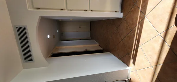 a bathroom with a sink and mirror