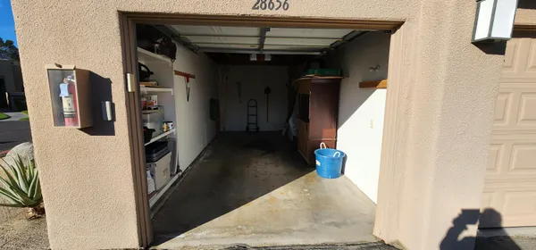 a view of hallway with seating space