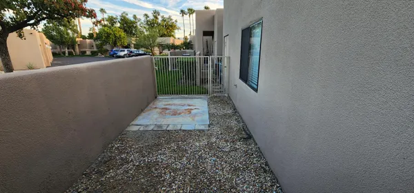 a view of a pathway of a house with a street