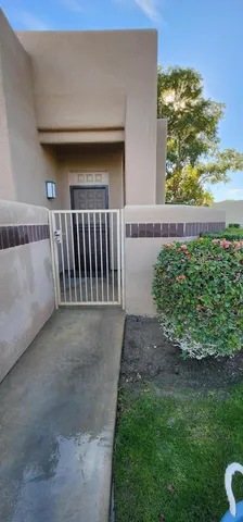 a view of backyard and entertaining space