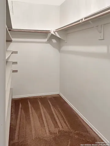 a view of small space with racks on the wall