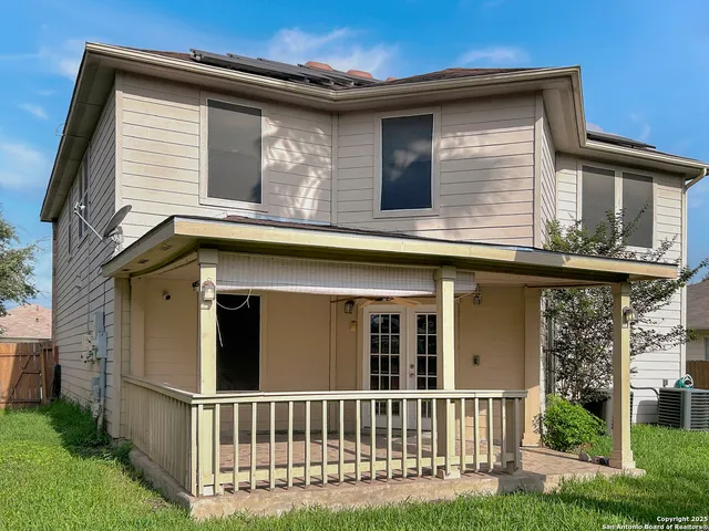 front view of a house with a small yard