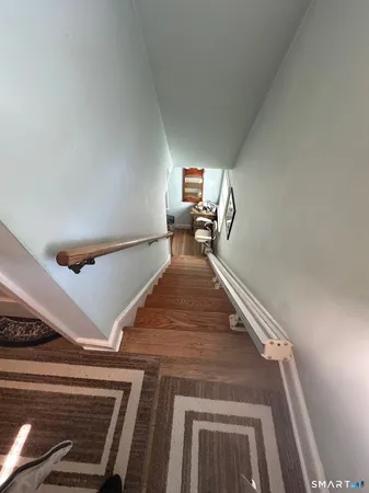 a view of entryway and kitchen