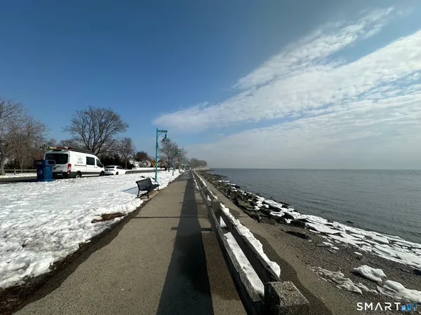 a bed room with a bed and a window