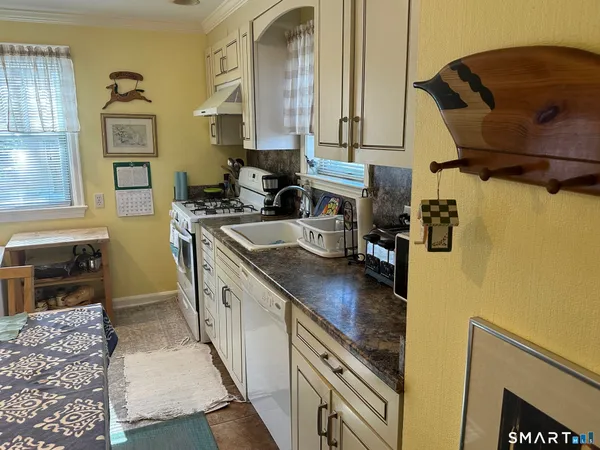 a bedroom with bed and window