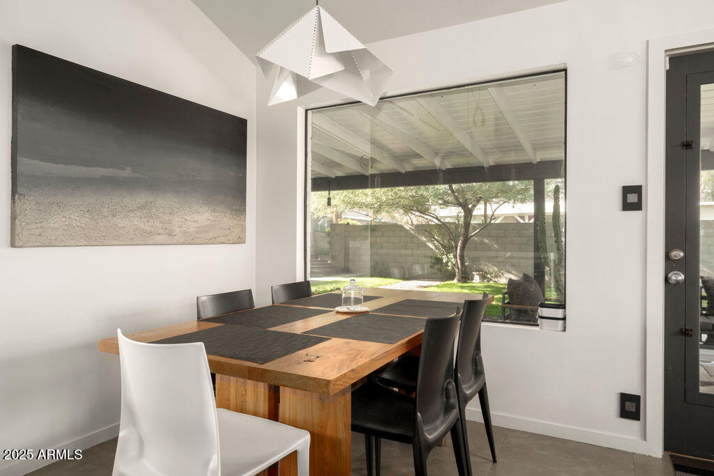 4530 North 9th Avenue Phoenix, AZ 85013 - Photo 12 of 35 a view of a dining room with furniture window and outside view