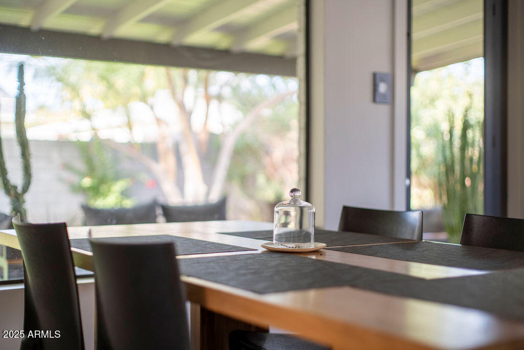 4530 North 9th Avenue Phoenix, AZ 85013 - Photo 13 of 35 a view of a dining table chair in an empty room