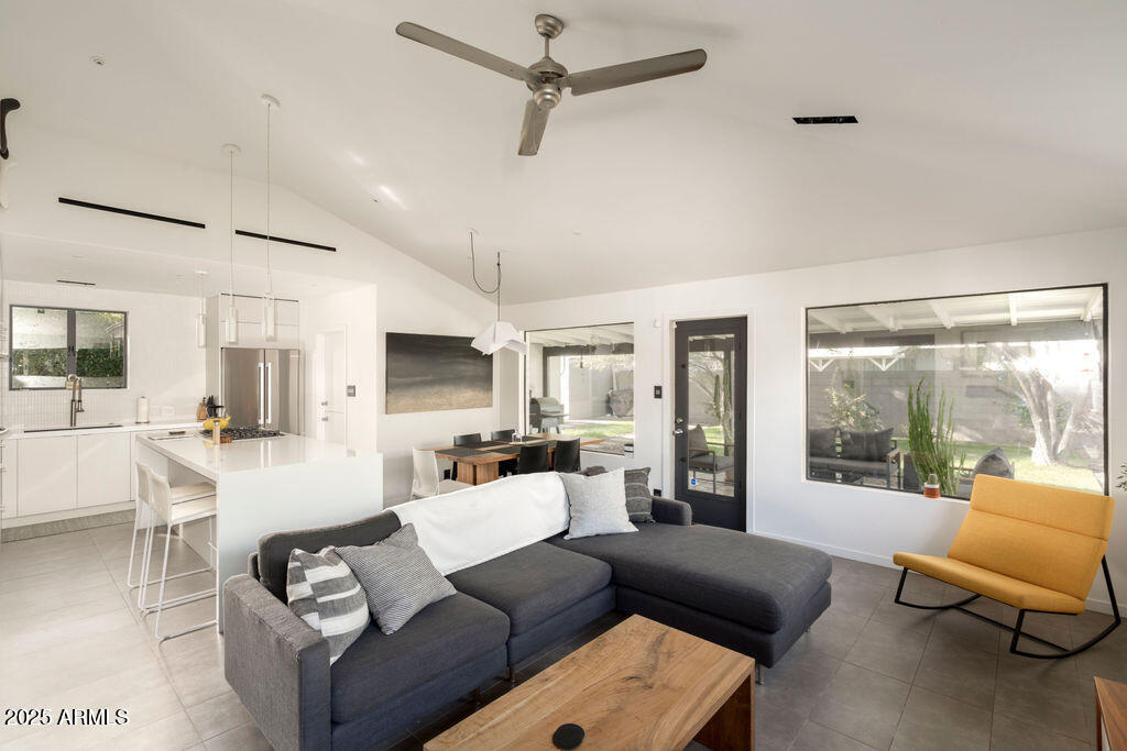 4530 North 9th Avenue Phoenix, AZ 85013 - Photo 14 of 35 a living room with furniture and a large window