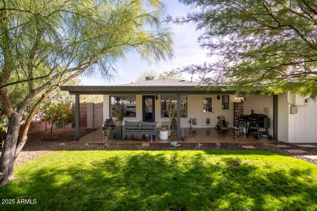 4530 North 9th Avenue Phoenix, AZ 85013 - Photo 24 of 35 a view of a house with swimming pool and sitting area