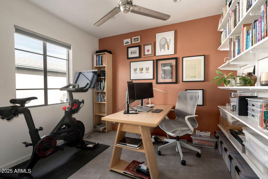4530 North 9th Avenue Phoenix, AZ 85013 - Photo 31 of 35 a view of a workspace with furniture and a window