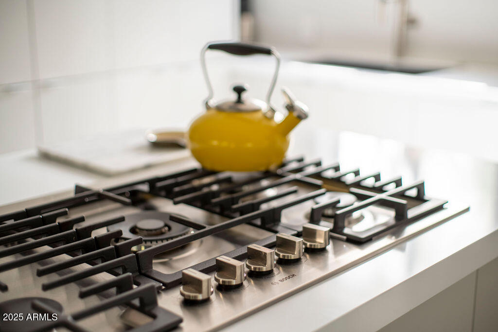 4530 North 9th Avenue Phoenix, AZ 85013 - Photo 5 of 35 a bathroom with a sink and a mirror