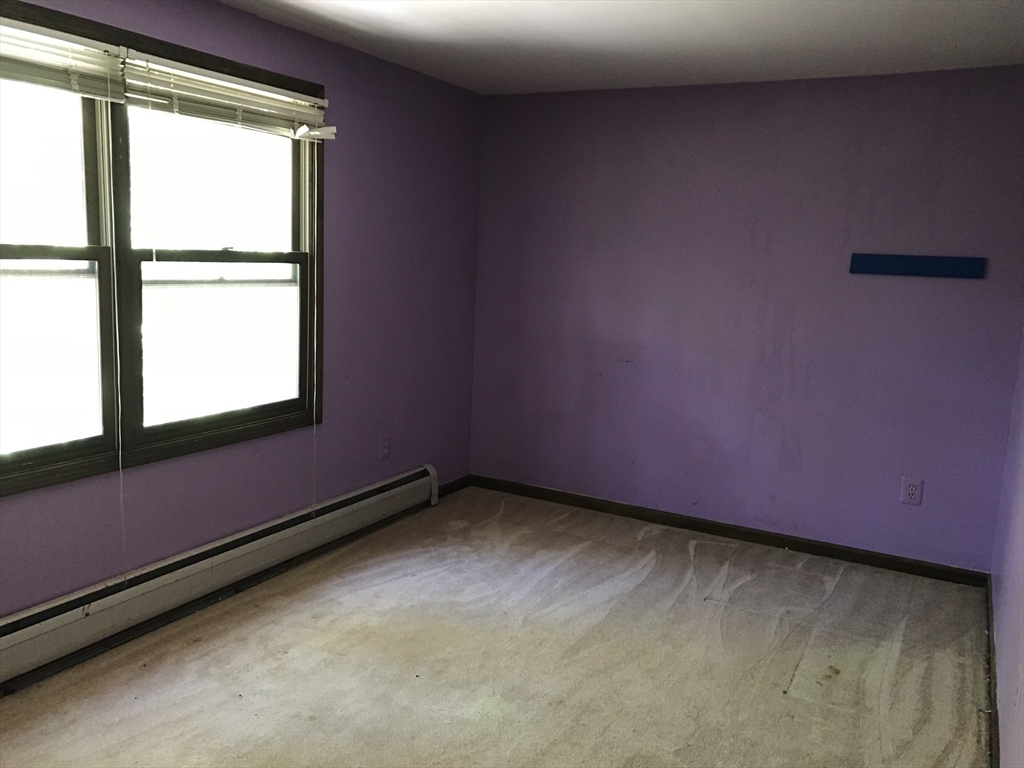 61 South Plain Road Sunderland, MA 01375 - Photo 25 of 36 a view of an empty room with a window