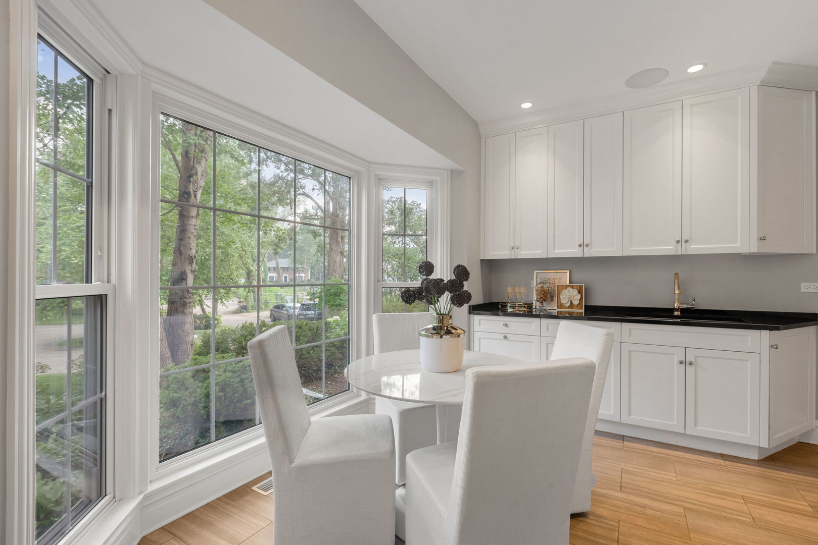 209 North Green Bay Road Lake Forest, IL 60045 - Photo 25 of 51 a kitchen with a table chairs and wooden floor