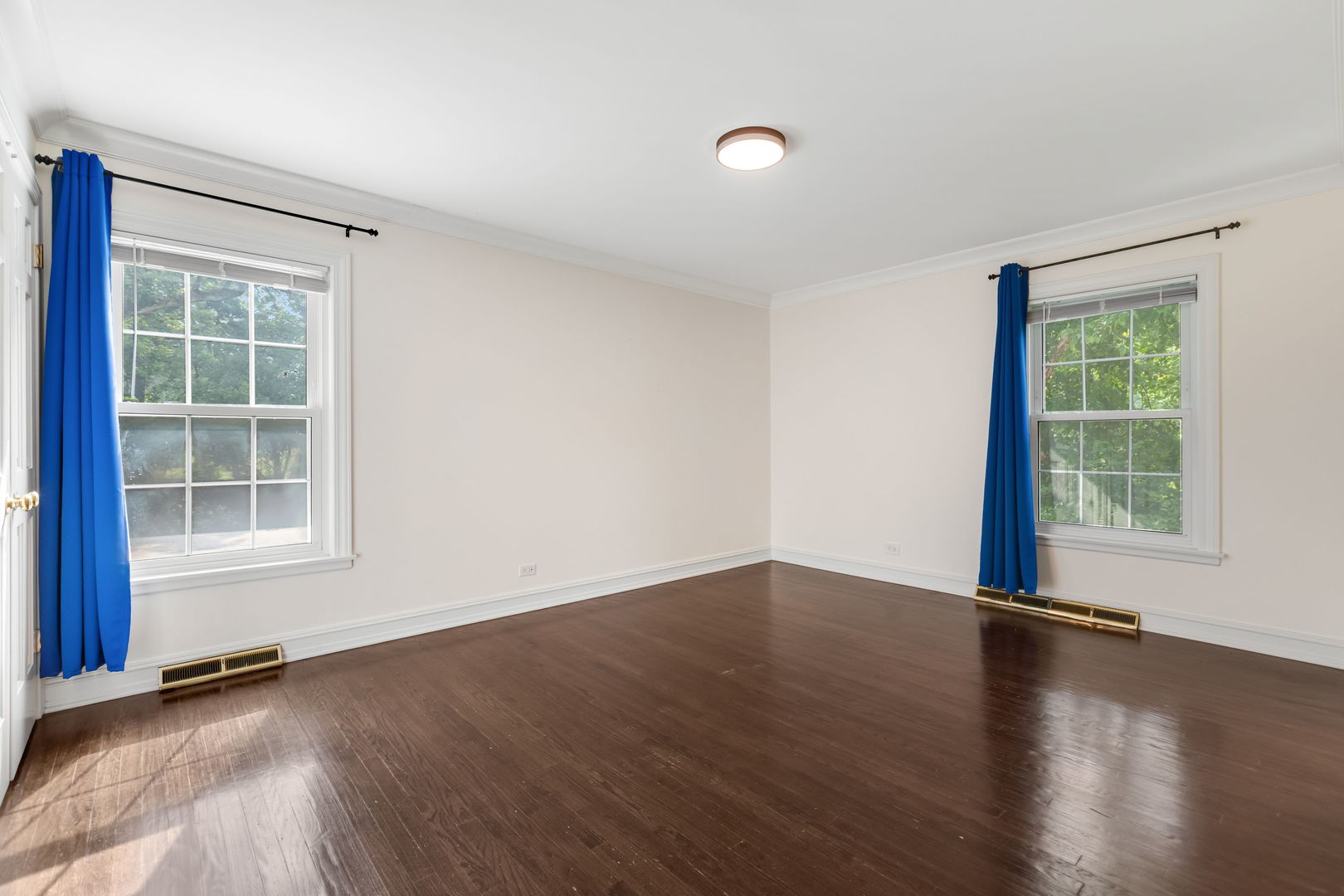209 North Green Bay Road Lake Forest, IL 60045 - Photo 37 of 51 an empty room with wooden floor and windows