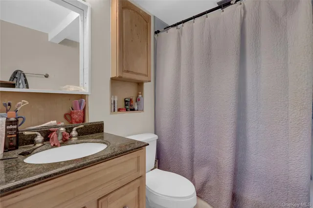 a view of a house with a yard porch and sitting area