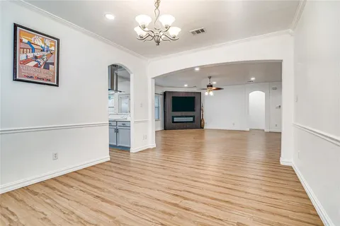 a view of a livingroom with wooden floor