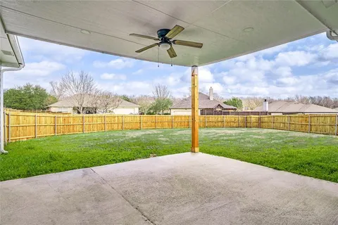 a view of a porch and garden