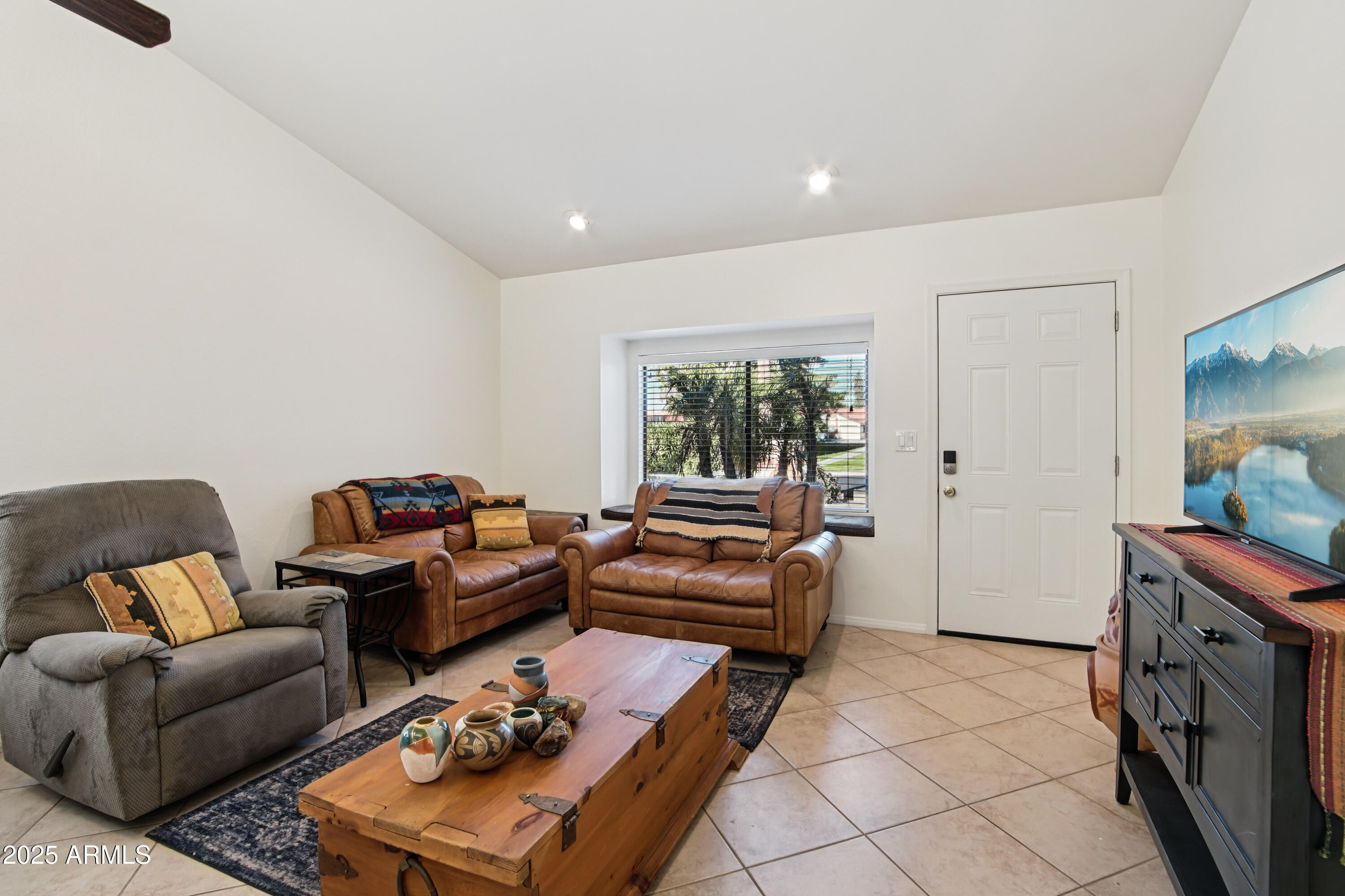 542 South Higley Road, Unit 89 Mesa, AZ 85206 - Photo 6 of 30 a living room with furniture and a window